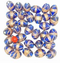 Perle indienne forme olive bleu marine 18x13mm x1