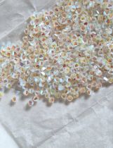 Toupie 5328 White Opal AB2X 4mm x50 Cristal Swarovski